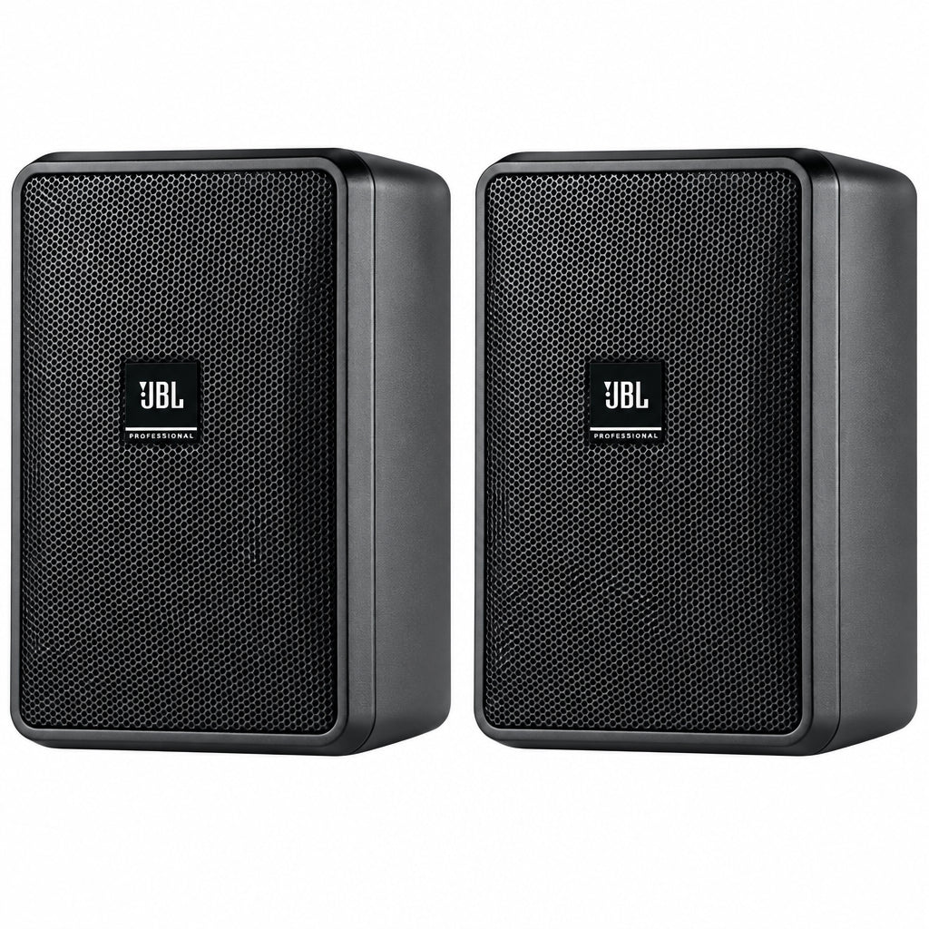 Pair of JBL 23 speakers on a white background